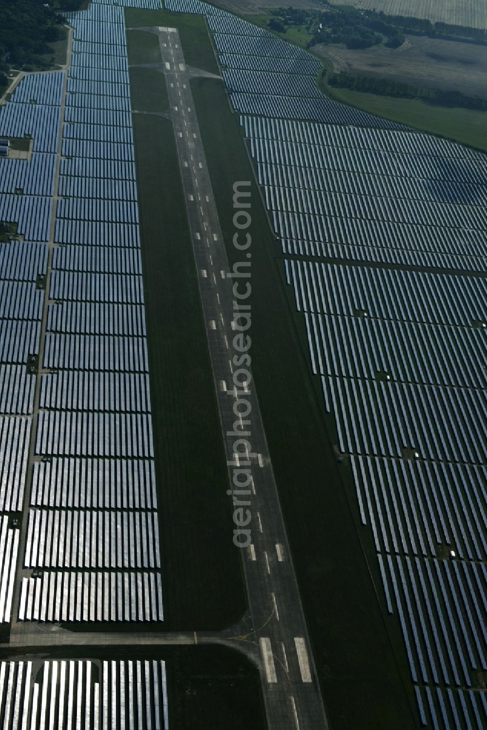 Neuhardenberg from above - Solar Park - Solar power plant and photovoltaic system BaySolar Projekt GmbH on the site of the airfield Neuhardenberg in Brandenburg. http://