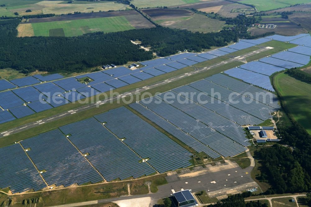 Neuhardenberg from above - Solar Park - Solar power plant and photovoltaic system BaySolar Projekt GmbH on the site of the airfield Neuhardenberg in Brandenburg. http://