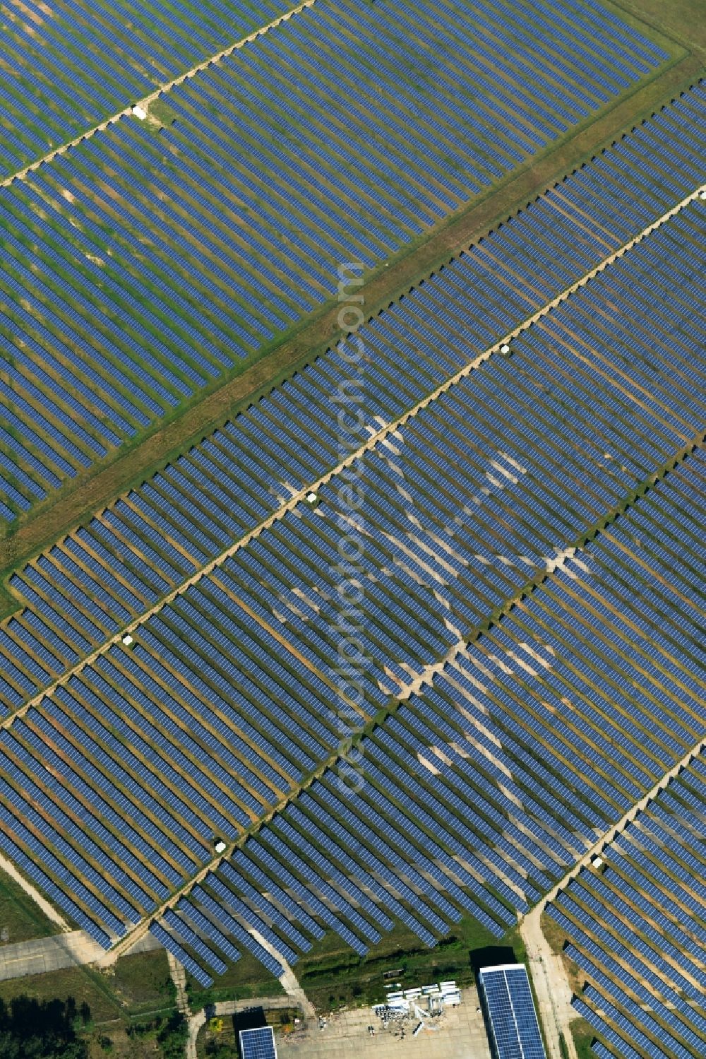 Neuhardenberg from the bird's eye view: Solar Park - Solar power plant and photovoltaic system BaySolar Projekt GmbH on the site of the airfield Neuhardenberg in Brandenburg. http://