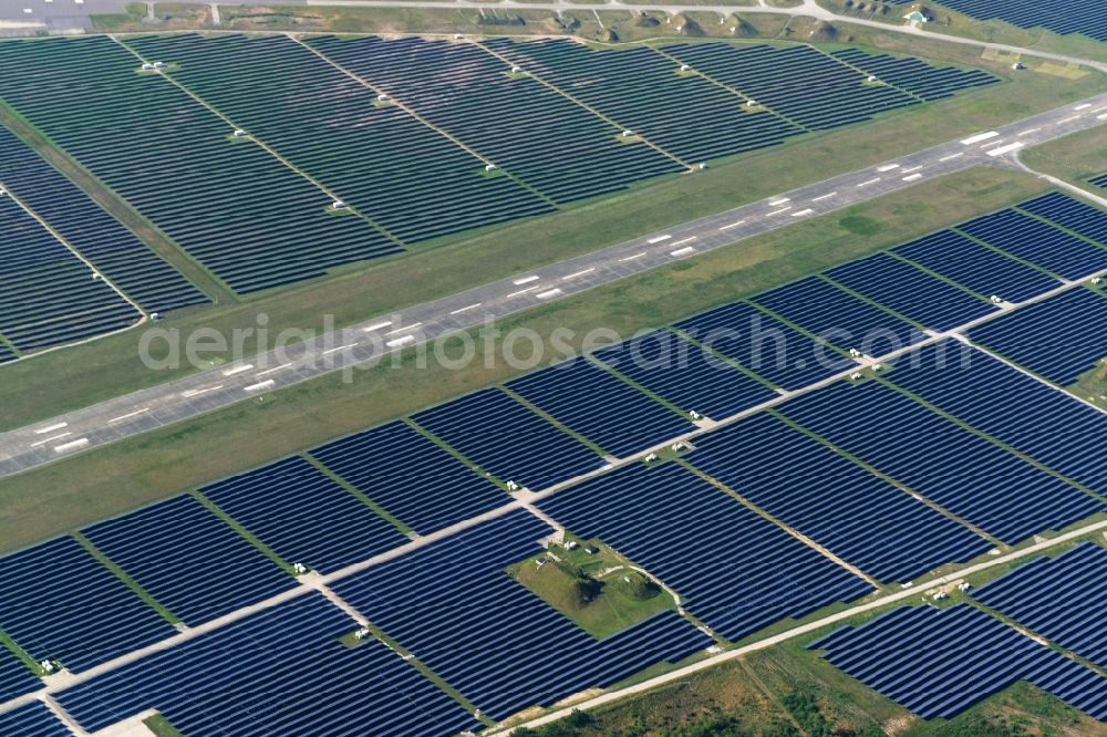 Neuhardenberg from above - Solar Park - Solar power plant and photovoltaic system BaySolar Projekt GmbH on the site of the airfield Neuhardenberg in Brandenburg. http://