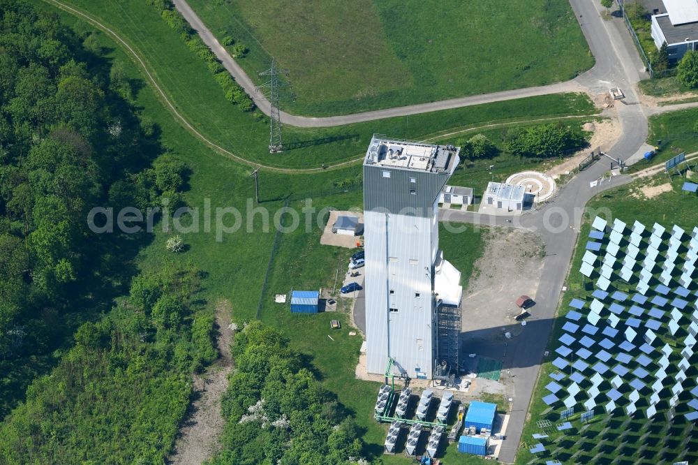 Jülich from the bird's eye view: Panel line up of the Photovoltaik arrangement and solar park or solar-thermal test power station with solar tower in Juelich in the federal state North Rhine-Westphalia, Germany