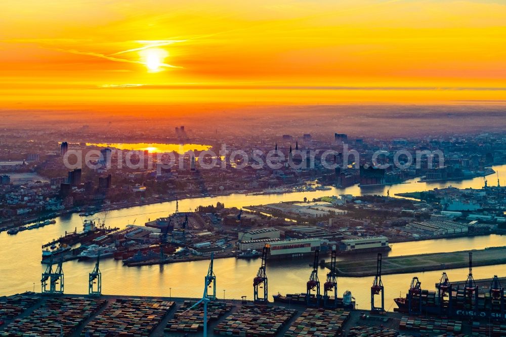 Hamburg from the bird's eye view: Sunrise over the countryside of the port on the river course of the Elbe in the district Steinwerder in Hamburg, Germany