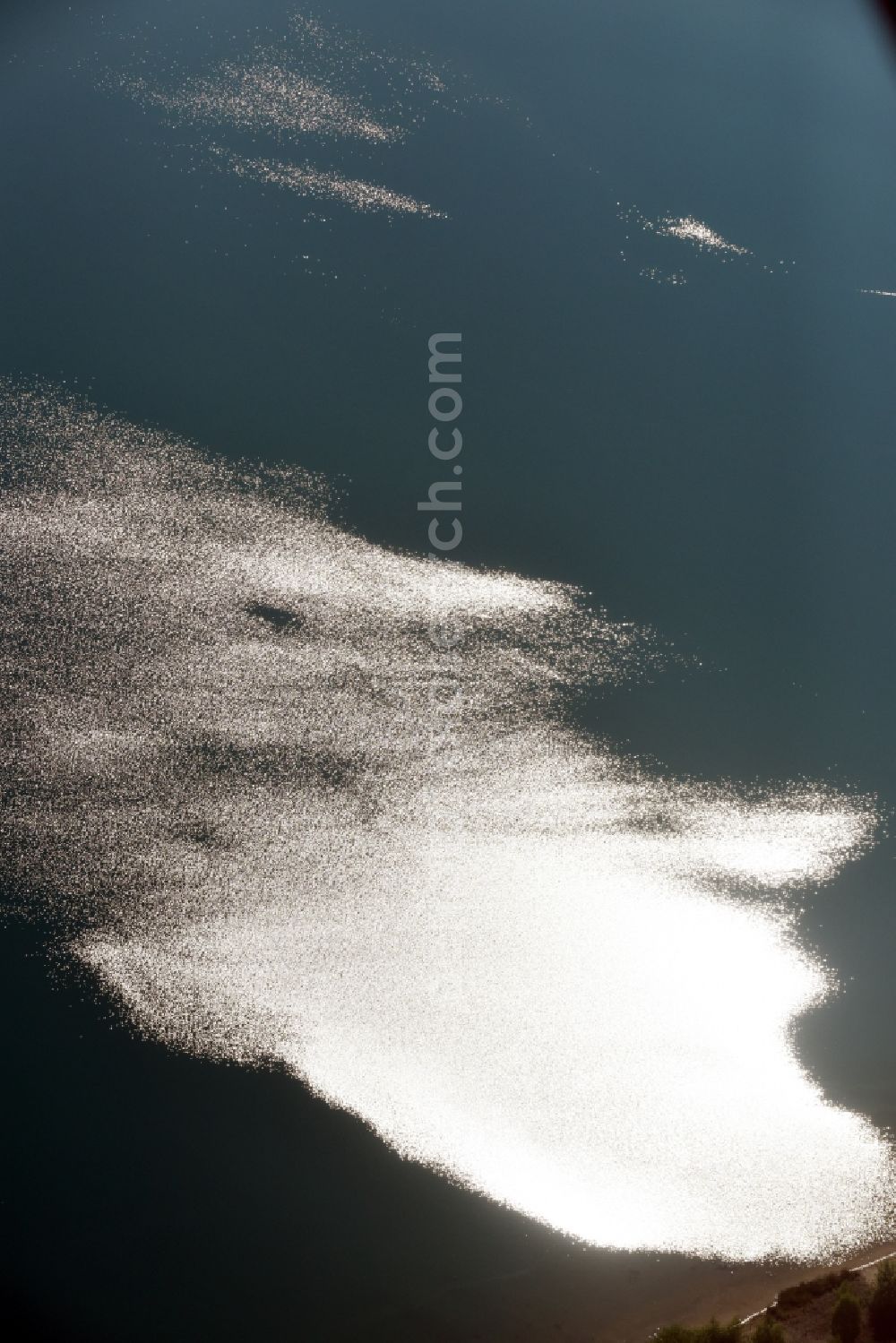 Kitzscher from the bird's eye view: Sunlight reflection on the surface of Bockwitzer See in Kitzscher in the state Saxony