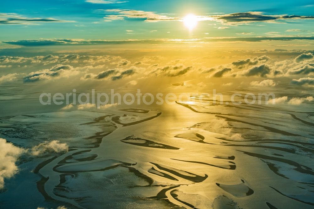 Cuxhaven from the bird's eye view: Sunset over the Wadden Sea landscape on the North Sea coast in Cuxhaven in the state, Germany