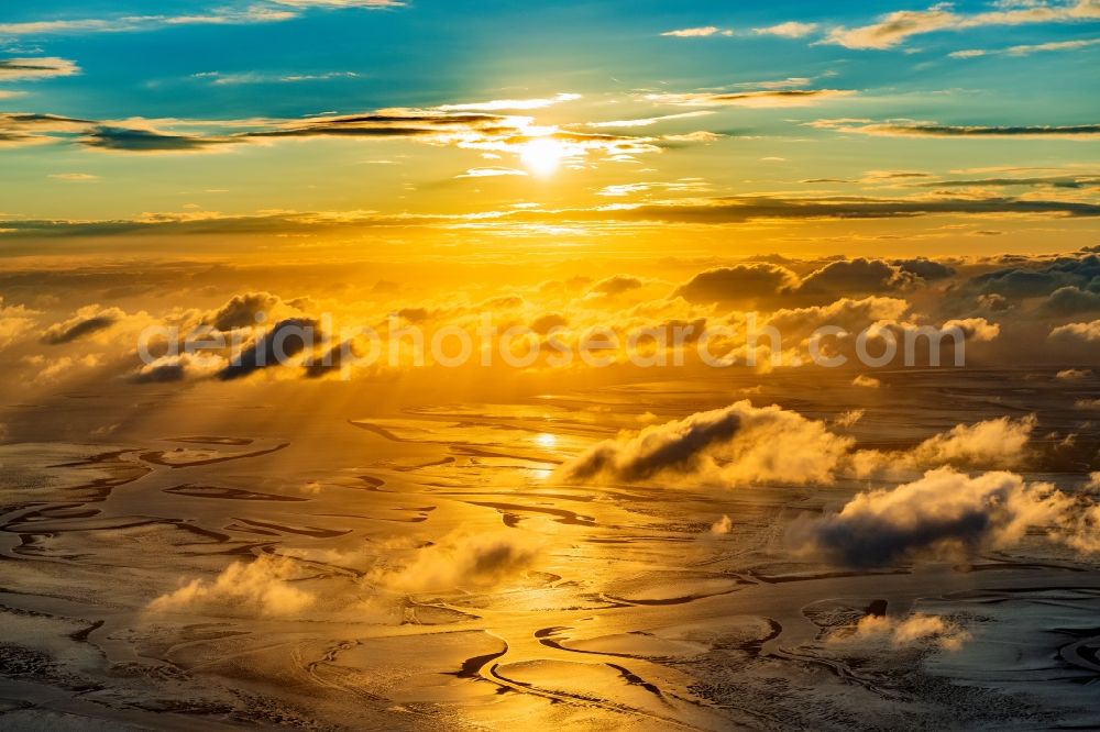 Cuxhaven from the bird's eye view: Sunset over the Wadden Sea landscape on the North Sea coast in Cuxhaven in the state, Germany