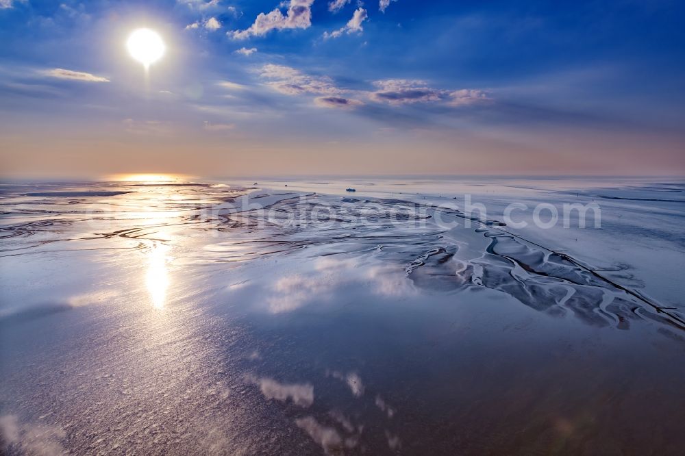 Cuxhaven from the bird's eye view: Sunset over the Wadden Sea landscape on the North Sea coast in Cuxhaven in the state, Germany