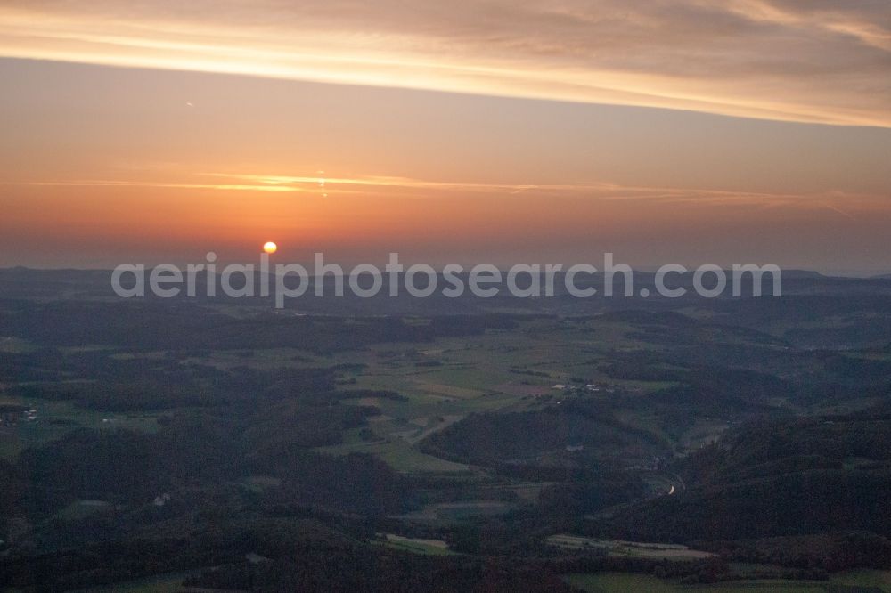 Ehingen (Donau) from the bird's eye view: Sunset over the countryside in Ehingen (Donau) in the state Baden-Wuerttemberg dyes the sky in a red and orange colour