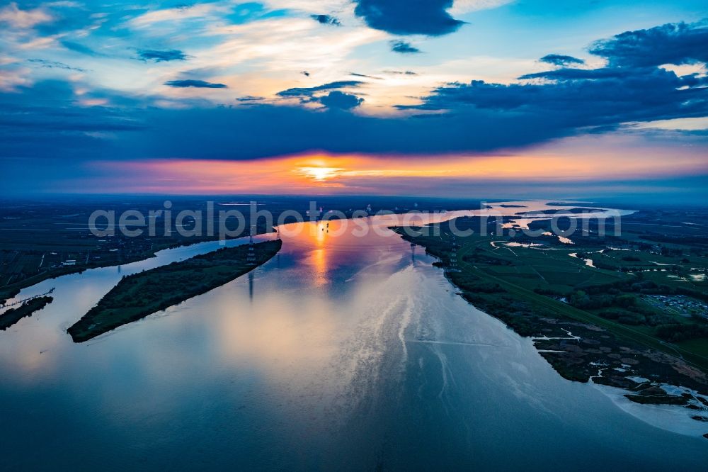 Aerial image Lühesand - Sunset over the countryside and Elbe river in Luehesand in the state Lower Saxony, Germany