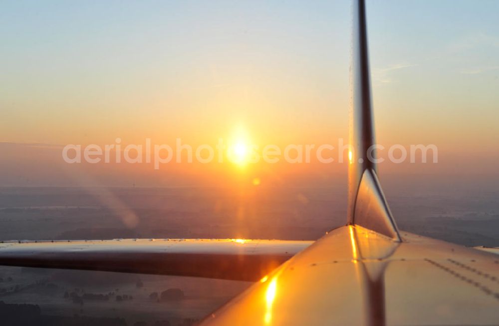 Aerial image Heiligenfeld - Blick aus einer Cessna 172 der Agentur euroluftbild.de D-EGYC auf den Sonnenaufgang bei Heiligenfelde in Sachsen-Anhalt. View out of a Cessna 172 at the sunrise near by Heiligenfelde in Saxony Anhalt.