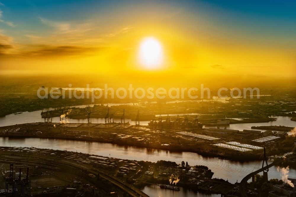 Aerial image Hamburg - Sunrise over the Container Terminal Tollerort in the port of the international port in district Steinwerder in Hamburg 