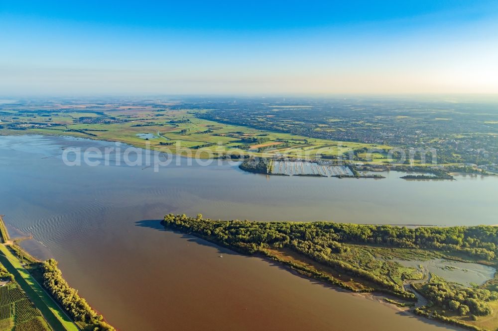 Hetlingen from the bird's eye view: Sunrise over Hetlingen in Wedel in the state Schleswig-Holstein, Germany