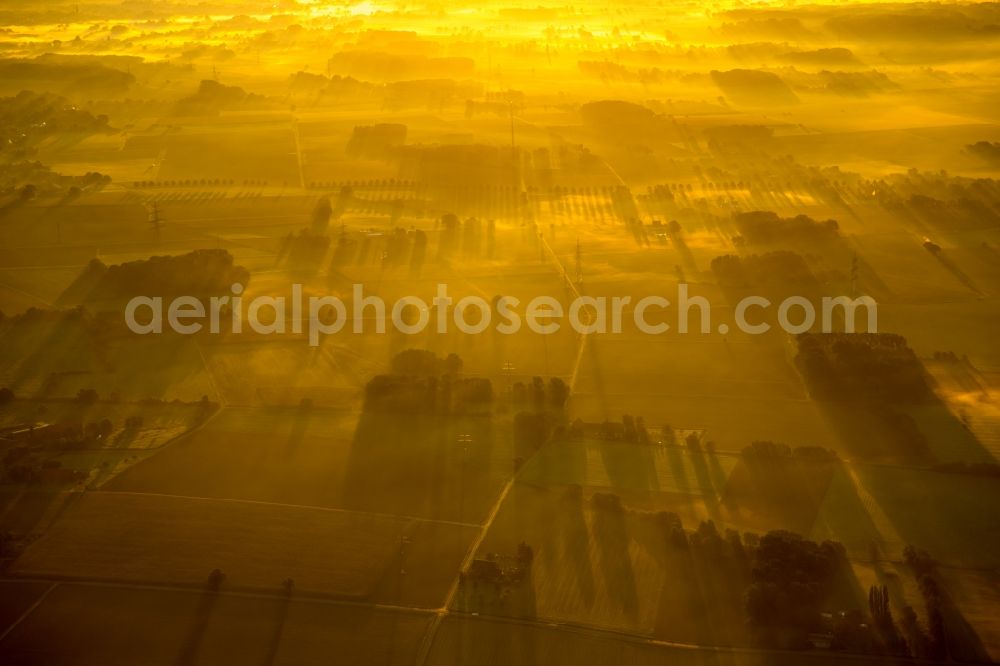 Hamm from above - Sunrise over the scenery of the eastern edge of town with farms and farming communities in Hamm in North Rhine-Westphalia