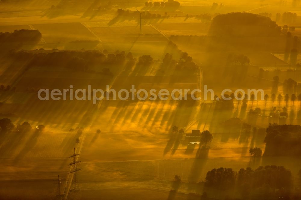 Aerial image Hamm - Sunrise over the scenery of the eastern edge of town with farms and farming communities in Hamm in North Rhine-Westphalia