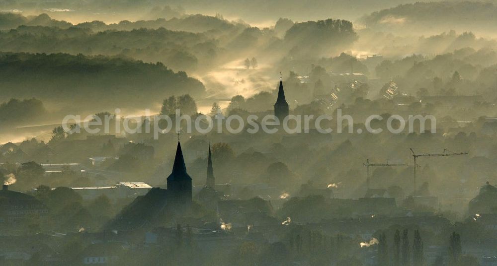 Dorsten from above - Blick auf den Sonnenaufgang über Dorsten, mit den Kirchen St. Agatha und St.Josef. Die Stadt liegt an der Lippe und Wesel-Datteln-Kanal.