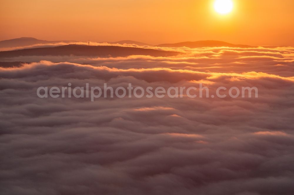 Sächsische Schweiz from above - Sunrise above the clouds in the Saxon Switzerland in Saxony