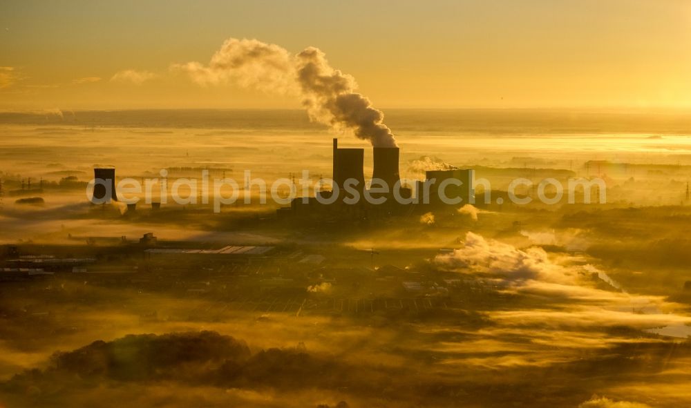 Hamm from the bird's eye view: Sunrise at coal-fired power plant of RWE in the district Schmehausen of Hamm in North Rhine-Westphalia