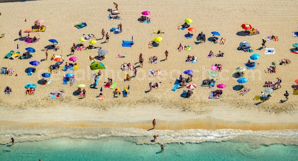 Palma from the bird's eye view: Parasol - rows on the sandy beach in the coastal area on Ballermann 12 in Palma in Balearic island of Mallorca, Spain