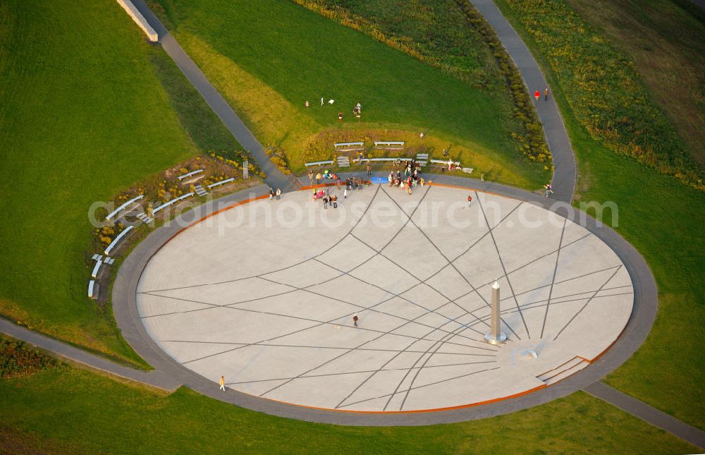 Aerial image RECKLINGHAUSEN - View of Halde Hoheward with its solar clock between the cities of Recklinghausen and Herten in Nort Rhine-Westphalia. The solar clock, with its obelisk serving as a pointer, is part of the horizon oberservatory. Together with the Halde Hoppenbruch, Halde Hoheward forms the landscape park Hoheward ( formerly Emscherbruch )