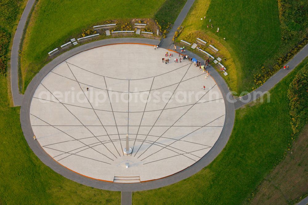 RECKLINGHAUSEN from above - View of Halde Hoheward with its solar clock between the cities of Recklinghausen and Herten in Nort Rhine-Westphalia. The solar clock, with its obelisk serving as a pointer, is part of the horizon oberservatory. Together with the Halde Hoppenbruch, Halde Hoheward forms the landscape park Hoheward ( formerly Emscherbruch )