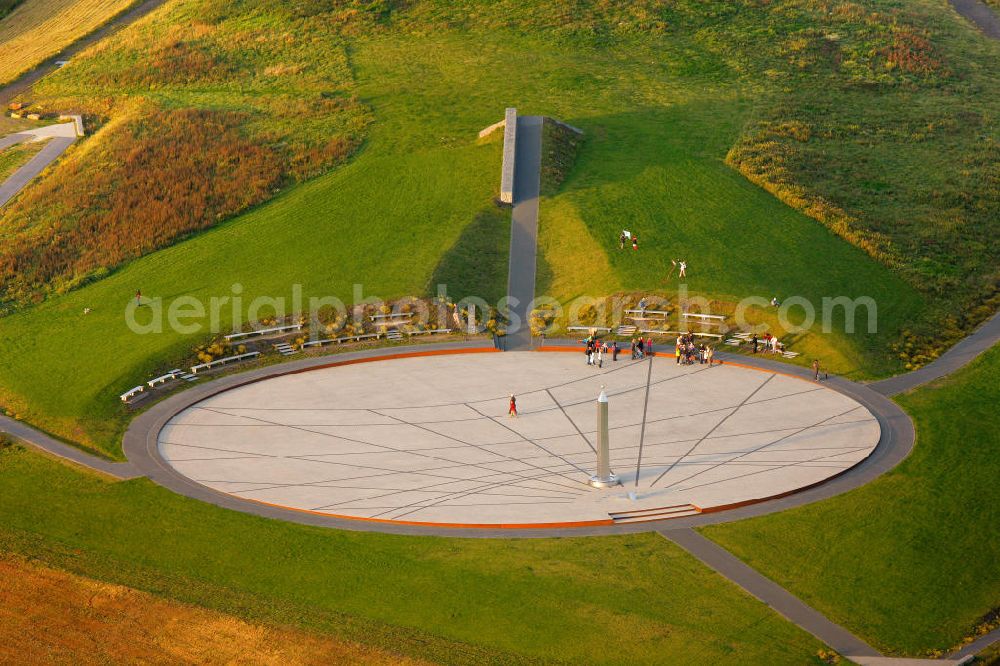 Aerial image RECKLINGHAUSEN - View of Halde Hoheward with its solar clock between the cities of Recklinghausen and Herten in Nort Rhine-Westphalia. The solar clock, with its obelisk serving as a pointer, is part of the horizon oberservatory. Together with the Halde Hoppenbruch, Halde Hoheward forms the landscape park Hoheward ( formerly Emscherbruch )