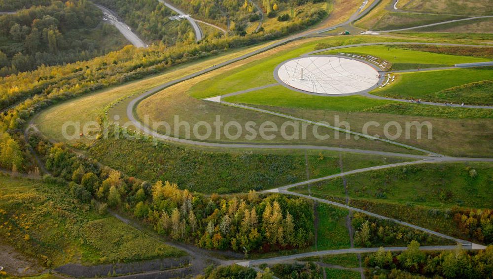 Aerial image RECKLINGHAUSEN - View of Halde Hoheward with its solar clock between the cities of Recklinghausen and Herten in Nort Rhine-Westphalia. The solar clock, with its obelisk serving as a pointer, is part of the horizon oberservatory. Together with the Halde Hoppenbruch, Halde Hoheward forms the landscape park Hoheward ( formerly Emscherbruch )