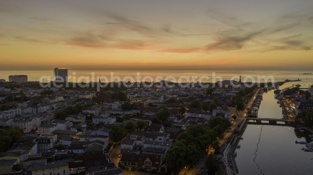 Aerial photograph Rostock - City sun set view on the river bank Alter Strom in the district Warnemuende in Rostock in the state Mecklenburg - Western Pomerania, Germany