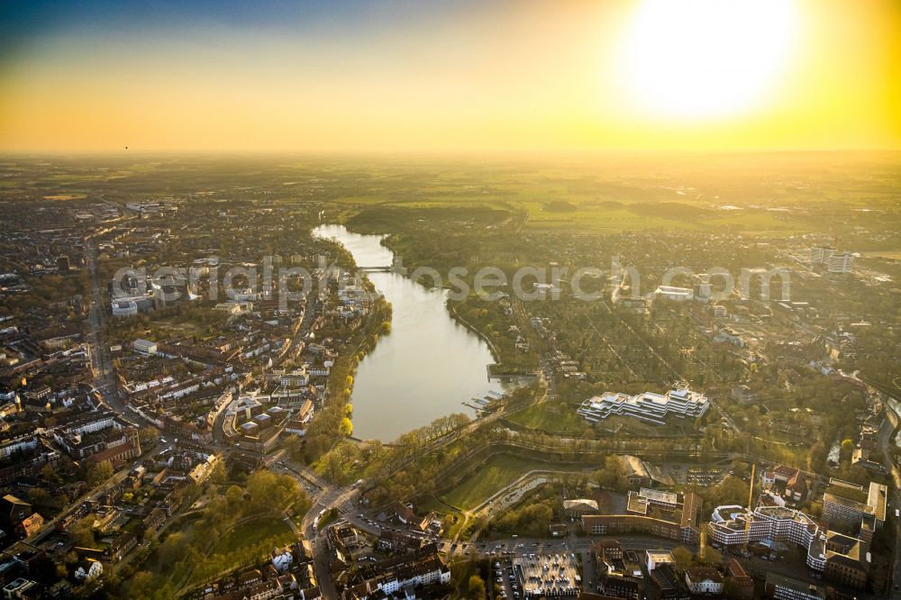 Aerial photograph Münster - Sunset over the riparian areas on the lake area of Aasee in Muenster in the state North Rhine-Westphalia, Germany