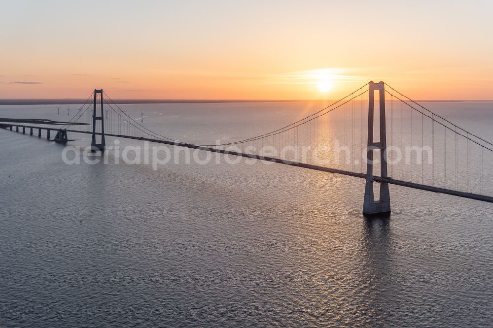 Aerial image Korsoer - Sunset on the bridge construction across the Great Belt in Korsoer in Syddanmark, Denmark