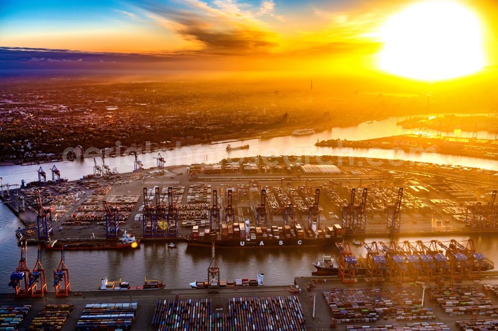 Hamburg from above - Sunset on Container Terminal in the port of the international port of the EUROGATE Container Terminal Hamburg GmbH in Hamburg