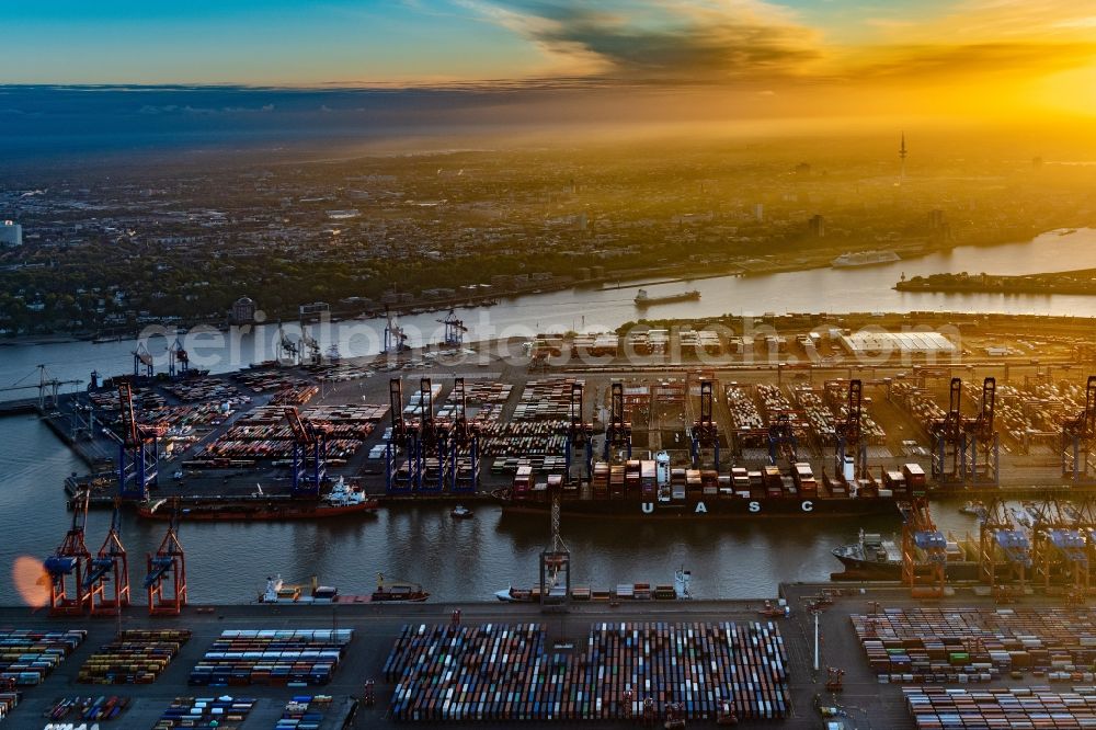 Aerial image Hamburg - Sunset on Container Terminal in the port of the international port of the EUROGATE Container Terminal Hamburg GmbH in Hamburg