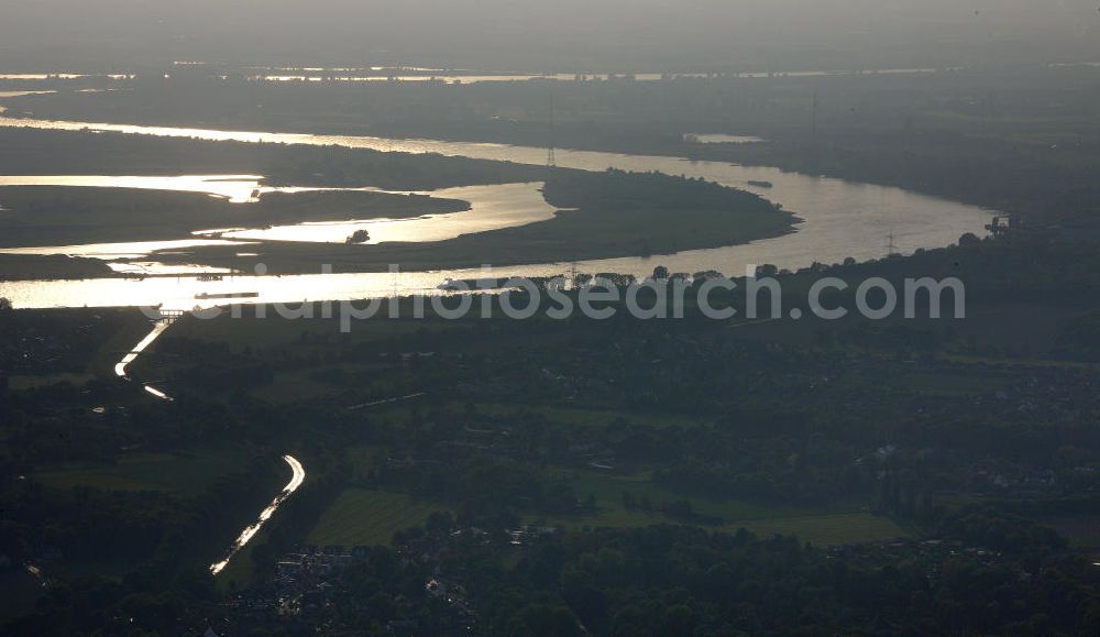 Dinslaken from the bird's eye view: Sonnenuntergang an der Emscher, einem Nebenfluss des Rheins im Ruhrgebiet bei Dinslaken. Sunset at the Emscher, a tributary of the Rhine in the Ruhr at Dinslaken.