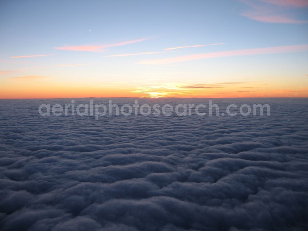 Römerstein from the bird's eye view: Sunset scene with cloud floor in Roemerstein Baden-Wuerttemberg