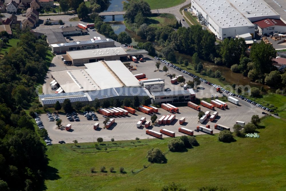 Krautheim from the bird's eye view: Freight forwarding building a logistics and transport company of Ruedinger Spedition GmbH at the Uferweg in Krautheim in the state Baden-Wurttemberg, Germany