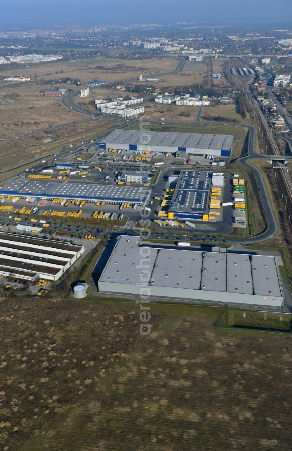 Schönefeld from the bird's eye view: View of the forwarding and stock construction of the company Dachser GmbH & Co. KG in Schoenefeld in the state Brandenburg