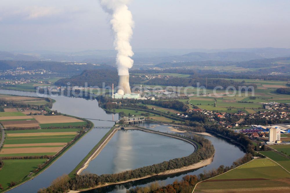 Aerial image Dogern - Das Flußkraftwerk Albbruck-Dogern der Rheinkraftwerk Albbruck-Dogern AG liegt im Rhein auf der deutsch-schweizerischen Grenze. Rechts im Bild ist die Stadt Leibstadt OT Bernau. Auch im Bild ist das Kernkraftwerk Leibstadt mit seinem Siedewasserreaktor. Es wird betrieben von der Kernkraftwerk Leibstadt AG. The hydraulic power station Albbruck-Dogern of the company Rheinkraftwerk Albbruck-Dogern AG is located in the Rhine on the border between Germany and Switzerland. At the right side there is the town Leibstadt OT Bernau. In the center of the picture there is the nuclear power plant Leibstadt with its boiling water reactor run by the company Kernkraftwerk Leibstadt AG.