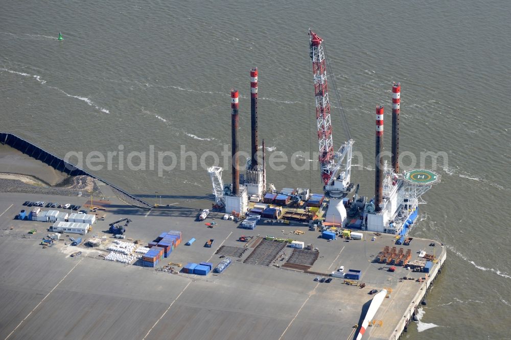 Aerial image Cuxhaven - Ship - specialized vessel to wind power station - installation in offshore wind farms in the port in Cuxhaven in the state Lower Saxony