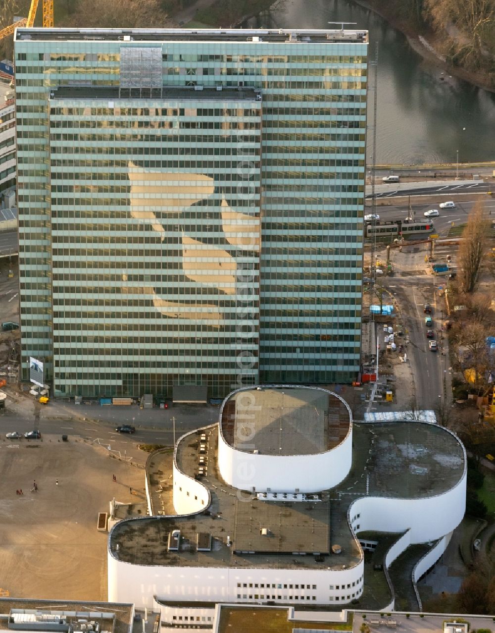 Düsseldorf from above - Reflection / mirror image of the theater in the glass - facade of the skyscraper Dreischeibenhaus in Dusseldorf in North Rhine-Westphalia