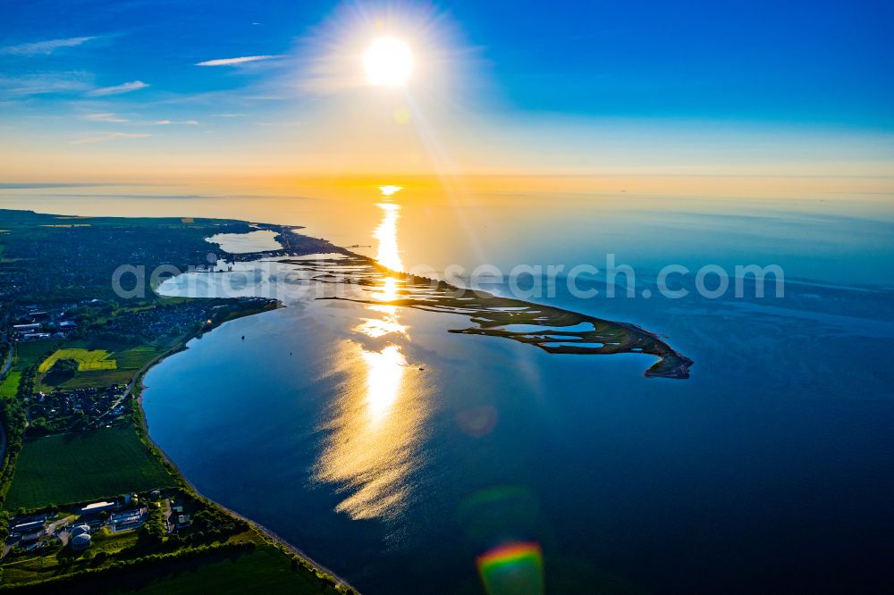 Aerial image Großenbrode - Reflection and sun rays reflection on the water - surface in Grossenbrode on the Baltic Sea coast in the state Schleswig-Holstein, Germany