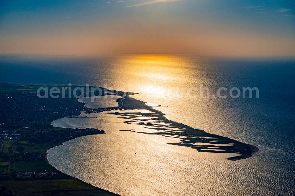 Großenbrode from the bird's eye view: Reflection and sun rays reflection on the water - surface in Grossenbrode on the Baltic Sea coast in the state Schleswig-Holstein, Germany