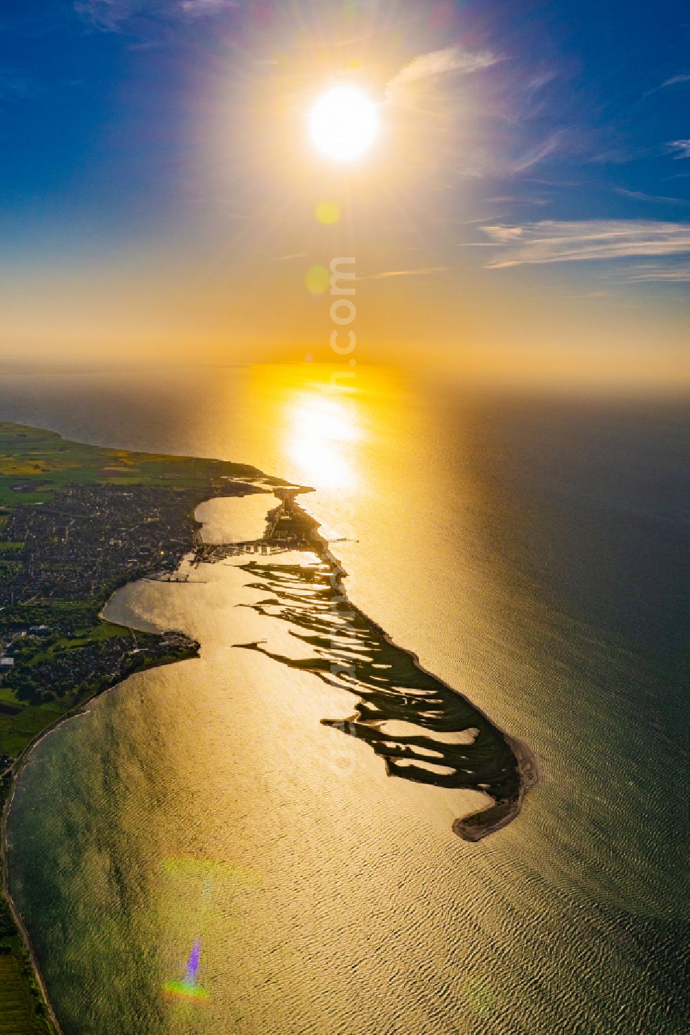 Aerial image Großenbrode - Reflection and sun rays reflection on the water - surface in Grossenbrode on the Baltic Sea coast in the state Schleswig-Holstein, Germany