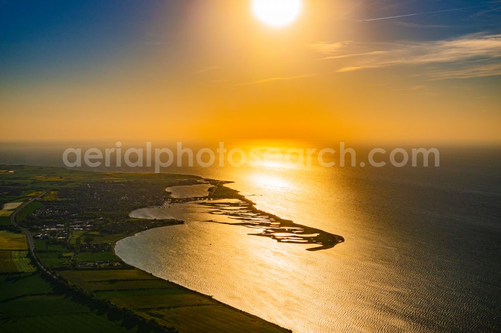 Großenbrode from the bird's eye view: Reflection and sun rays reflection on the water - surface in Grossenbrode on the Baltic Sea coast in the state Schleswig-Holstein, Germany