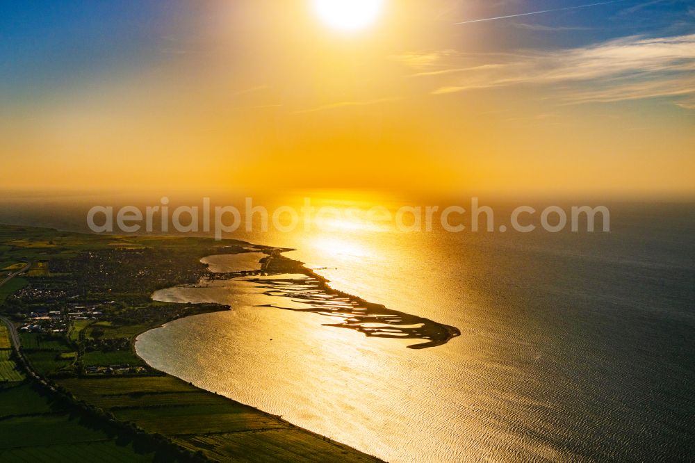 Aerial image Großenbrode - Reflection and sun rays reflection on the water - surface in Grossenbrode on the Baltic Sea coast in the state Schleswig-Holstein, Germany