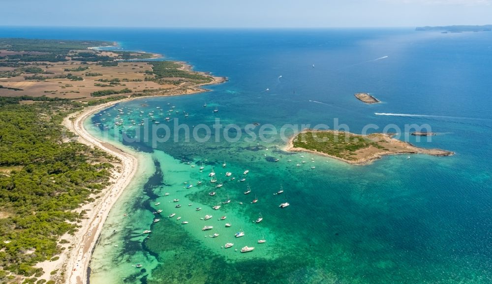 Aerial image Ses Salines - Sun rays Reflection on the water surface and Schiffe on Balearen-Meer in Ses Salines in Balearische Insel Mallorca, Spain