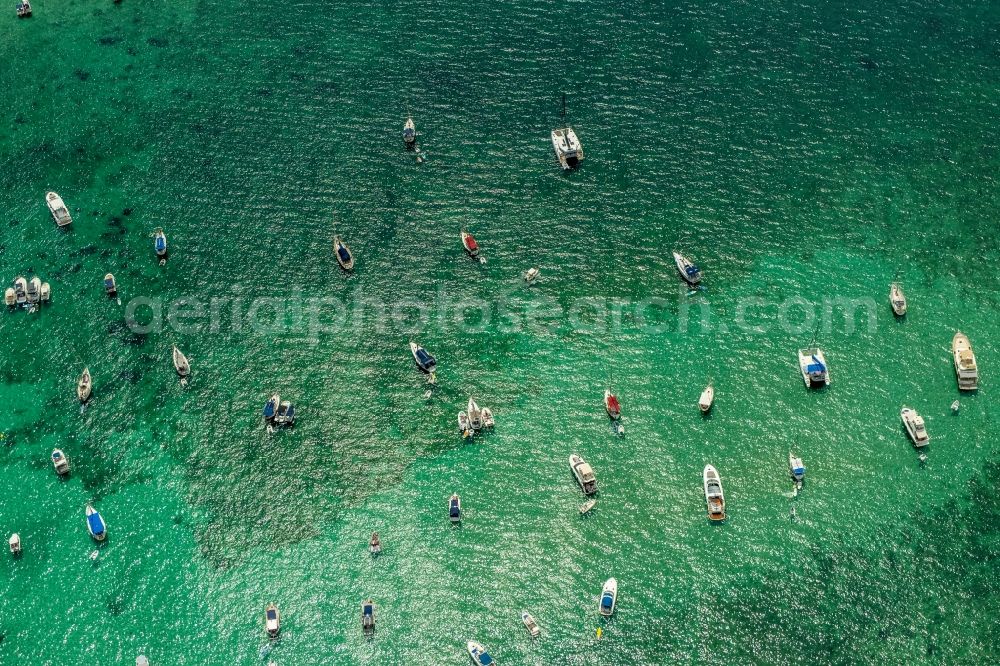 Aerial photograph Ses Salines - Sun rays Reflection on the water surface and Schiffe on Balearen-Meer in Ses Salines in Balearische Insel Mallorca, Spain