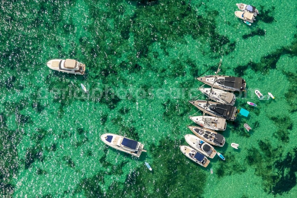 Ses Salines from the bird's eye view: Sun rays Reflection on the water surface and Schiffe on Balearen-Meer in Ses Salines in Balearische Insel Mallorca, Spain