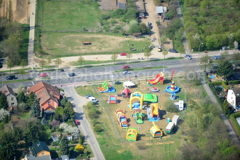 Schönefeld from above - Playground - bouncy castle at the Waltersdorfer Chaussee corner Friedenstraße in Schönefeld in Brandenburg