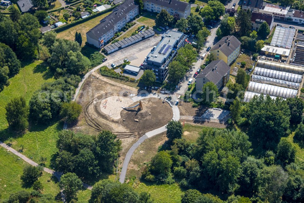 Aerial photograph Witten - Assembly of playground equipment on a construction site for the new construction of the playground on street Dirschauer Strasse in Witten at Ruhrgebiet in the state North Rhine-Westphalia, Germany