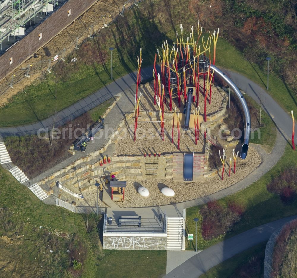 Aerial image Dortmund - Development of the shore of the lake Phoenix-See in Dortmund overlooking the adventure playground Phoenix Nest in the state North Rhine-Westphalia. On the shores of the lake Phoenix-See, under the topic of the mythical bird Phoenix, were built three adventure playgrounds