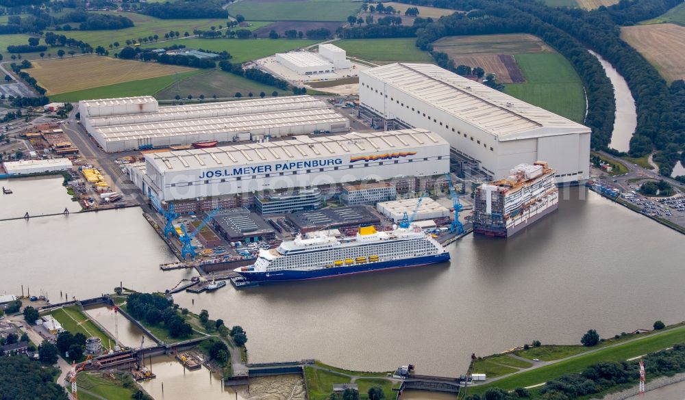 Aerial photograph Papenburg - Cruise ship Spirit of Adventure on the shipyard of the Meyer Werft in Papenburg in the state Lower Saxony, Germany