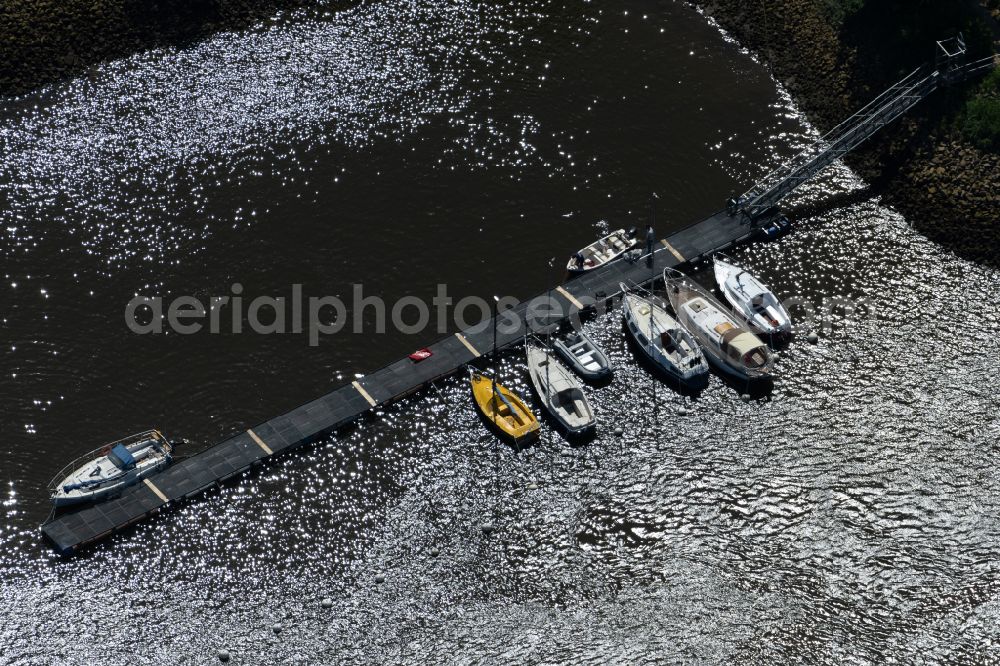 Bremen from above - Pleasure boat and sailing boat mooring and boat moorings in the harbor on the river bank area of the Weser river in the district Huckelriede in Bremen, Germany